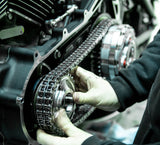 mechanic working on 30-Tooth Compensator Sprocket Kit